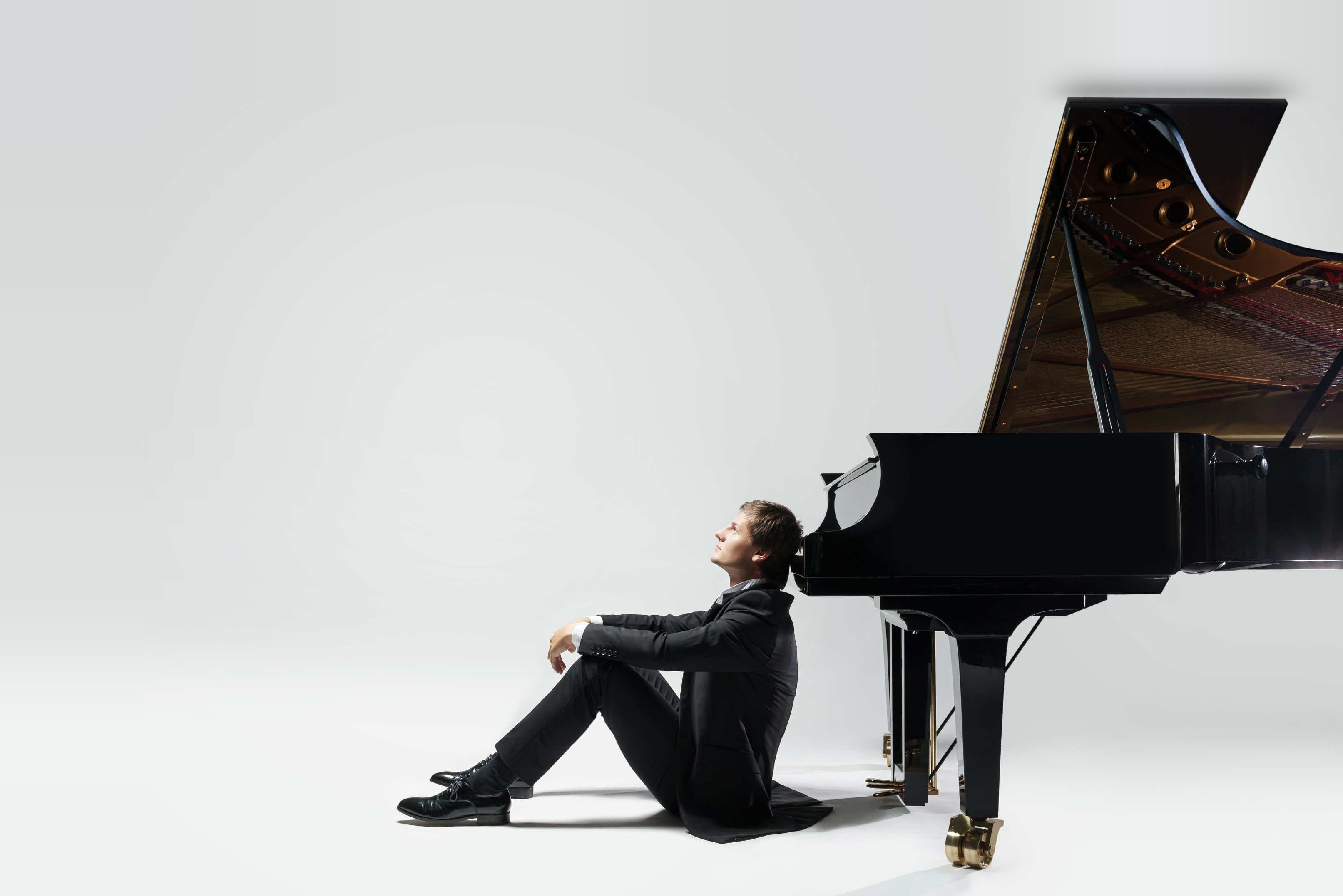 Gleb Koroleff seated at the piano